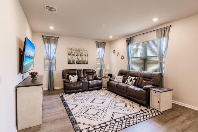 1123 Sugarwood St, Davenport, FL 33837 - living room featuring light wood-style flooring and recessed lighting