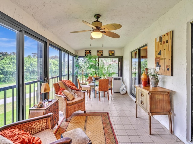 9199 Pecky Cypress Ln Unit 7H, Boca Raton, FL 33428 - sunroom featuring tile patterned flooring, a textured ceiling, and a textured wall