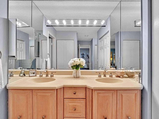 9199 Pecky Cypress Ln Unit 7H, Boca Raton, FL 33428 - bathroom featuring double vanity