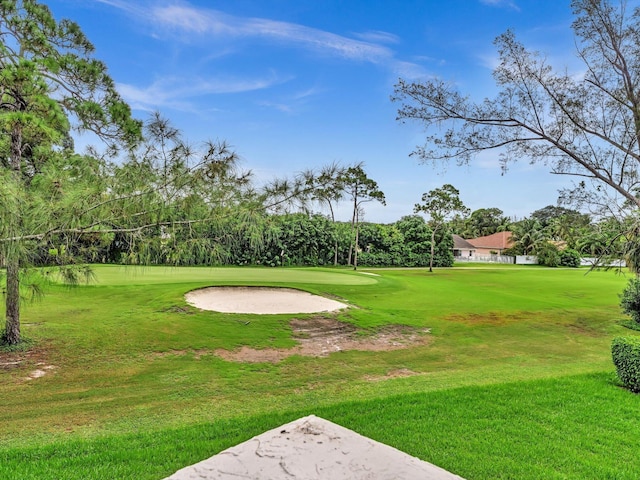 9199 Pecky Cypress Ln Unit 7H, Boca Raton, FL 33428 - view of community with golf course view, a lawn, and view of scattered trees