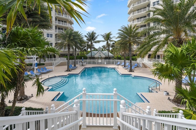 120 Ocean Grande Blvd Unit 302, Jupiter, FL 33477 - community pool featuring stairway and a patio