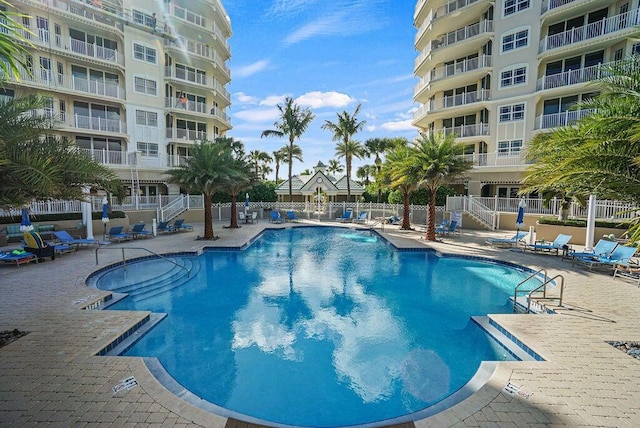 120 Ocean Grande Blvd Unit 302, Jupiter, FL 33477 - community pool with a patio