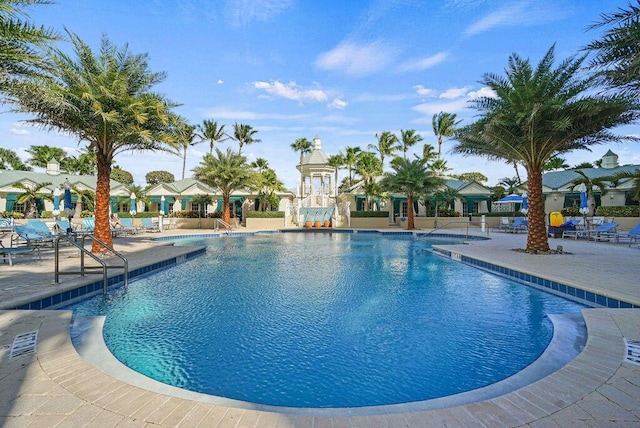 120 Ocean Grande Blvd Unit 302, Jupiter, FL 33477 - community pool featuring a patio