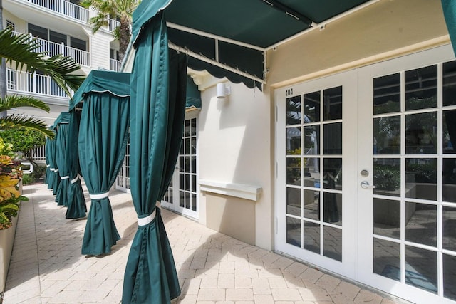 120 Ocean Grande Blvd Unit 302, Jupiter, FL 33477 - view of patio featuring french doors