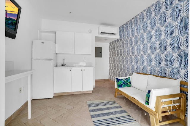 120 Ocean Grande Blvd Unit 302, Jupiter, FL 33477 - sitting room featuring wallpapered walls, an AC wall unit, electric panel, an accent wall, and bar with sink