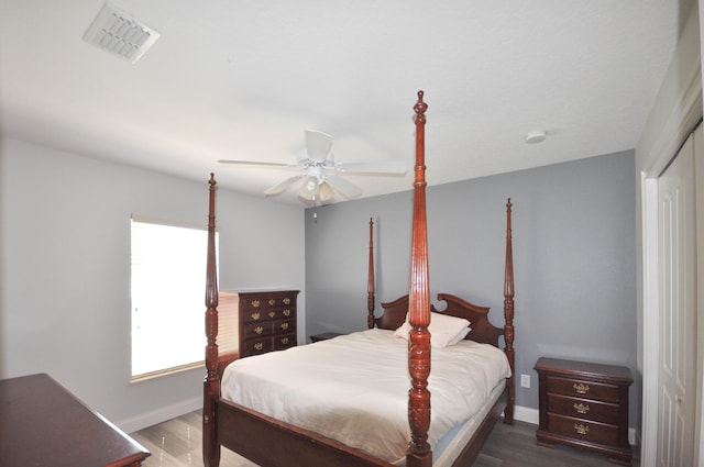 6771 NW Daffodil Ln, Port Saint Lucie, FL 34983 - bedroom featuring wood finished floors, a closet, and ceiling fan