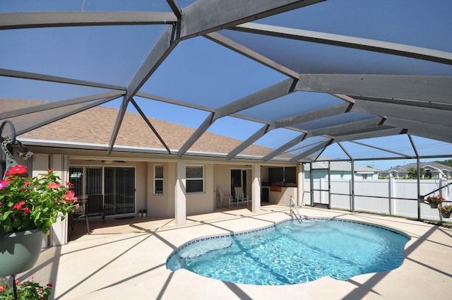 6771 NW Daffodil Ln, Port Saint Lucie, FL 34983 - swimming pool with a ceiling fan, a patio area, and a lanai