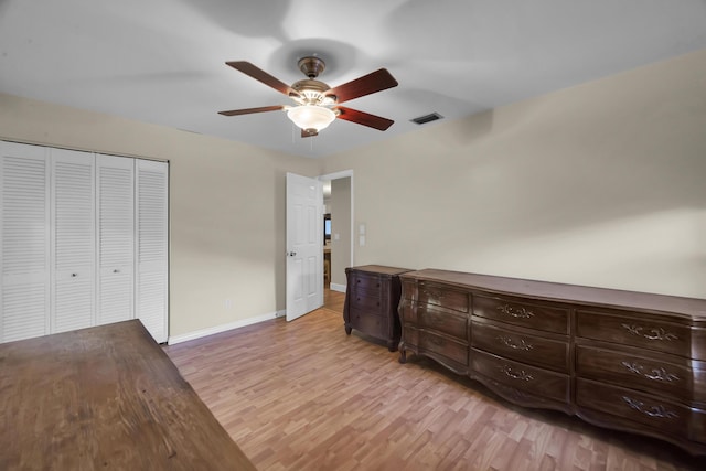 1966 9th St, Vero Beach, FL 32960 - unfurnished bedroom featuring light wood finished floors, a closet, and ceiling fan