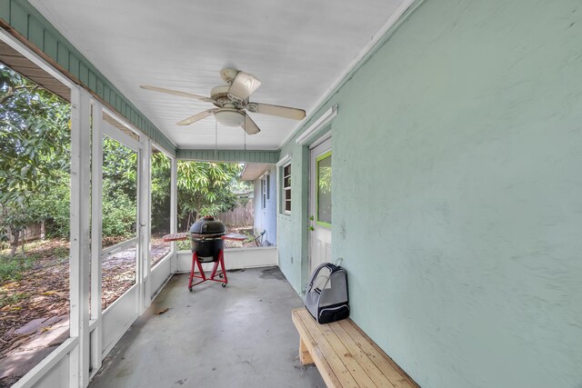 1966 9th St, Vero Beach, FL 32960 - unfurnished sunroom featuring a ceiling fan