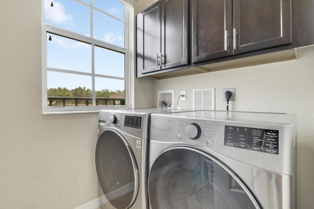 244 Behring Way, Jupiter, FL 33458 - washroom with cabinet space and washing machine and dryer