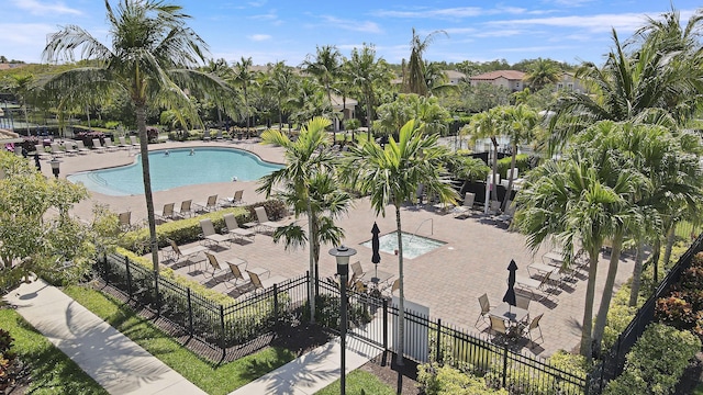 244 Behring Way, Jupiter, FL 33458 - community pool with a patio