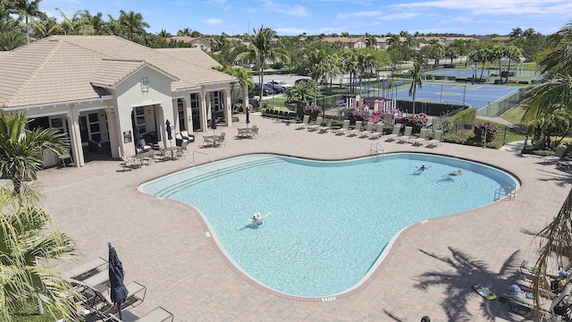 244 Behring Way, Jupiter, FL 33458 - community pool with a patio