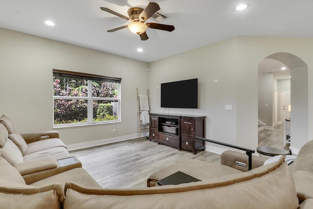 244 Behring Way, Jupiter, FL 33458 - living room featuring arched walkways, a ceiling fan, wood finished floors, and recessed lighting