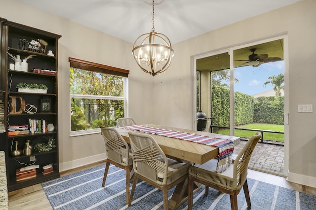 244 Behring Way, Jupiter, FL 33458 - dining area featuring a chandelier and a ceiling fan
