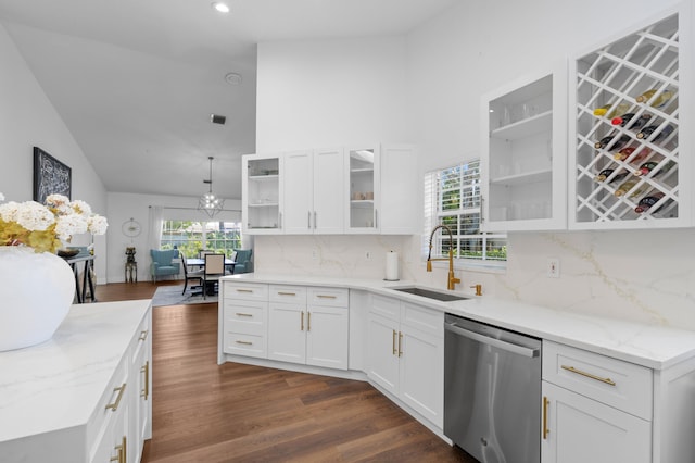 5160 Sabal Gardens Ln Unit 1, Boca Raton, FL 33487 - kitchen featuring stainless steel dishwasher, plenty of natural light, white cabinets, high vaulted ceiling, and recessed lighting