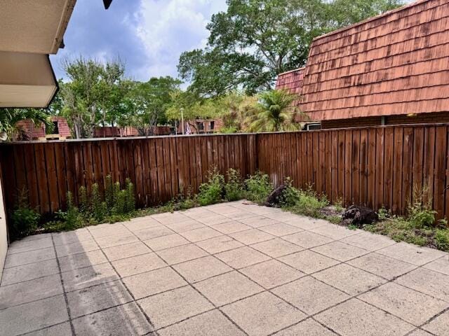 217 Live Oak Ln, Boynton Beach, FL 33436 - fenced backyard featuring a patio area