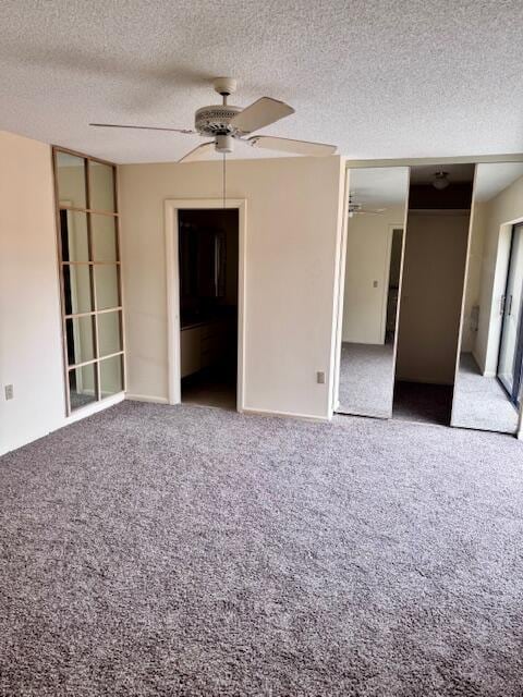 217 Live Oak Ln, Boynton Beach, FL 33436 - unfurnished bedroom featuring carpet, a textured ceiling, ceiling fan, and a closet