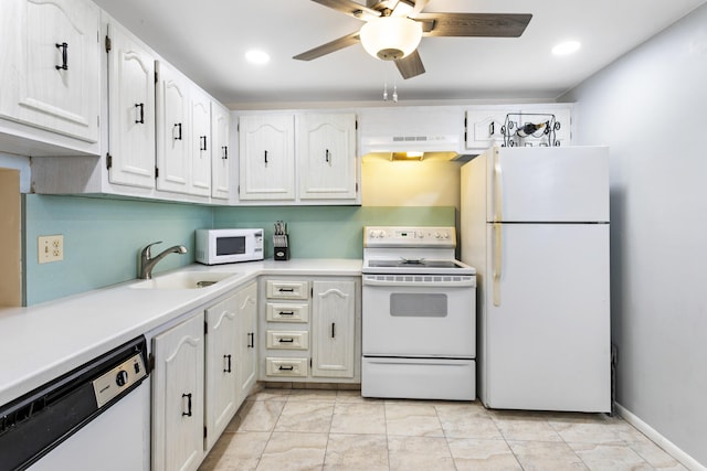 2600 NE 1st Ln Unit 3110, Boynton Beach, FL 33435 - kitchen featuring white appliances, under cabinet range hood, a ceiling fan, light countertops, and white cabinetry