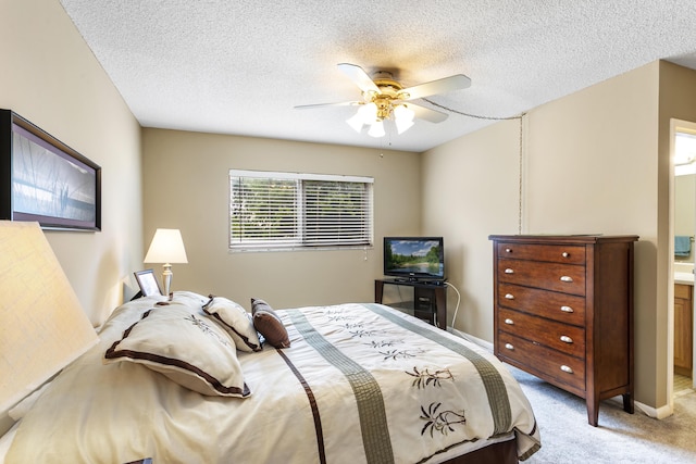 2600 NE 1st Ln Unit 3110, Boynton Beach, FL 33435 - bedroom featuring light carpet, a textured ceiling, and ceiling fan