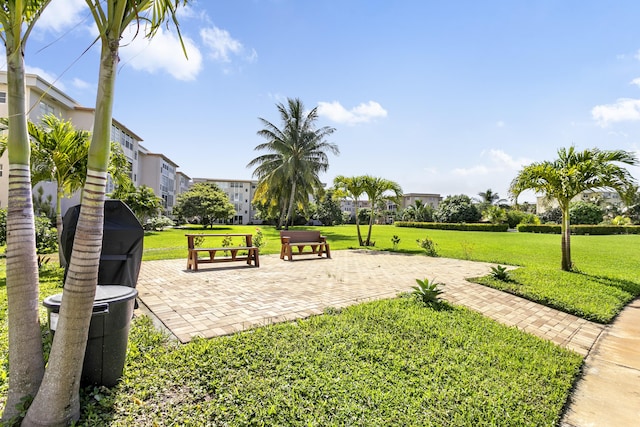 2600 NE 1st Ln Unit 3110, Boynton Beach, FL 33435 - surrounding community with a yard and a patio