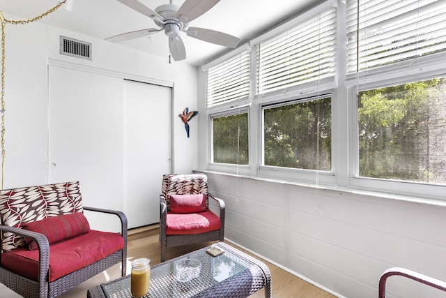 2600 NE 1st Ln Unit 3110, Boynton Beach, FL 33435 - living area with wood finished floors and a ceiling fan