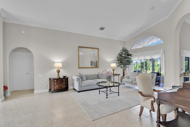 12388 Lakeridge Falls Dr, Boynton Beach, FL 33437 - living area featuring arched walkways, crown molding, and light tile patterned floors