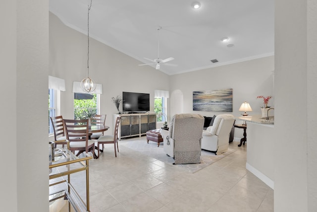 12388 Lakeridge Falls Dr, Boynton Beach, FL 33437 - living room with crown molding, ceiling fan, light tile patterned flooring, and high vaulted ceiling