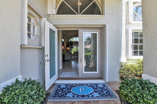 12388 Lakeridge Falls Dr, Boynton Beach, FL 33437 - property entrance featuring stucco siding