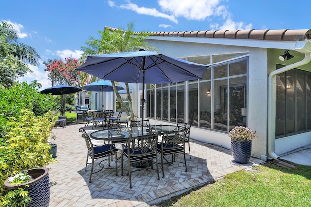 12388 Lakeridge Falls Dr, Boynton Beach, FL 33437 - view of patio featuring outdoor dining area