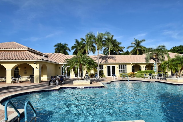 12388 Lakeridge Falls Dr, Boynton Beach, FL 33437 - community pool with a patio