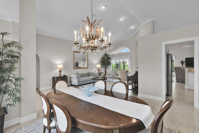 12388 Lakeridge Falls Dr, Boynton Beach, FL 33437 - dining area with arched walkways, a chandelier, light tile patterned floors, crown molding, and high vaulted ceiling