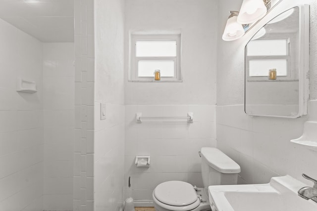 1144 NW 12th Ter, Stuart, FL 34994 - bathroom with tile walls and toilet