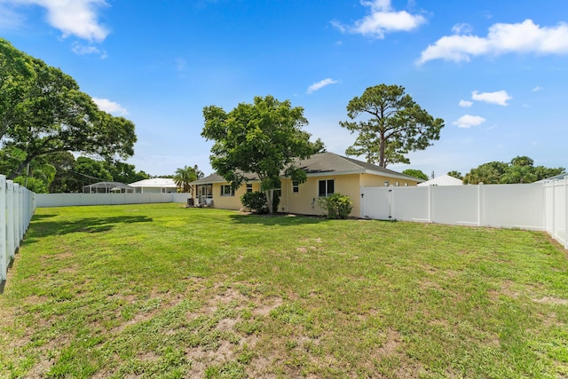 1144 NW 12th Ter, Stuart, FL 34994 - view of fenced backyard