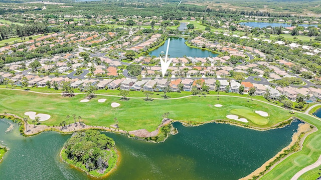 313 Eagleton Golf Dr, Palm Beach Gardens, FL 33418 - aerial view of property and surrounding area with nearby suburban area, a golf course, and a large body of water