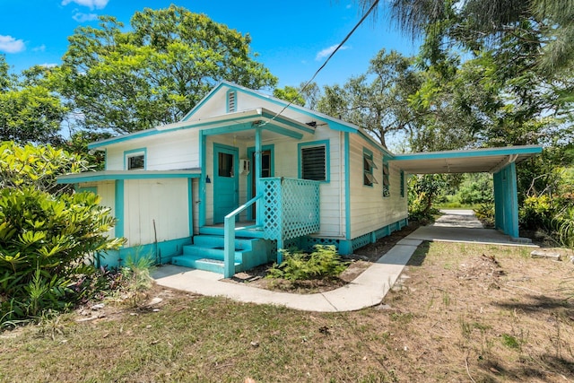 2302 Cortez Blvd, Fort Pierce, FL 34982 - view of front of home featuring an attached carport