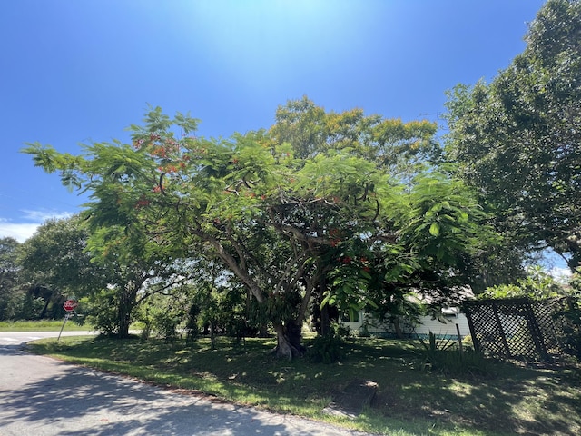 2302 Cortez Blvd, Fort Pierce, FL 34982 - view of asphalt road featuring traffic signs