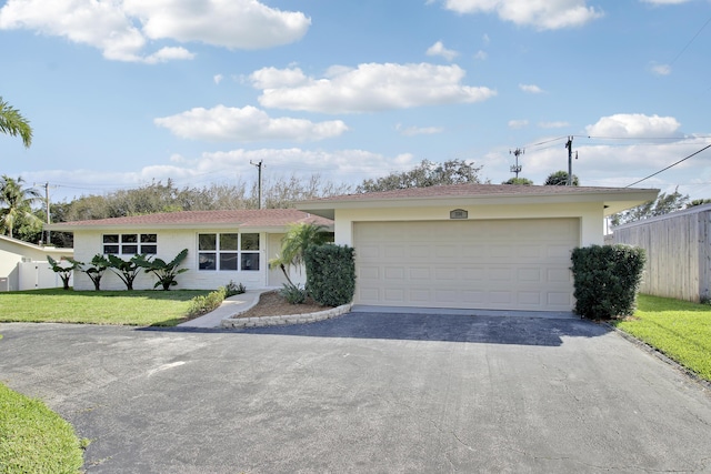 334 SW 14 Th Ave, Boynton Beach, FL 33435 - ranch-style home with driveway, stucco siding, and a garage