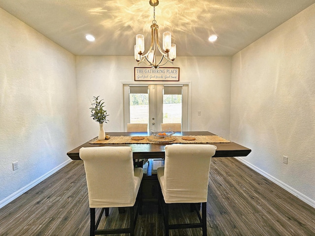 690 NE 150th Ct, Morriston, FL 32668 - dining space with a chandelier, french doors, dark wood-style flooring, a textured wall, and recessed lighting