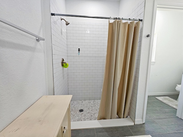 690 NE 150th Ct, Morriston, FL 32668 - bathroom with a stall shower and tile patterned floors