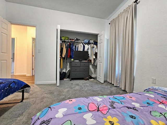 690 NE 150th Ct, Morriston, FL 32668 - carpeted bedroom with a closet and baseboards
