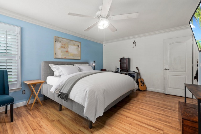468 SW Prado Ave, Port Saint Lucie, FL 34983 - bedroom with light wood-style floors, crown molding, and ceiling fan