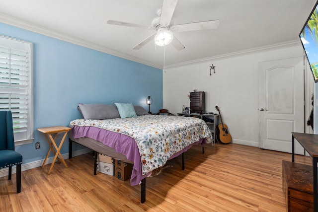 468 SW Prado Ave, Port Saint Lucie, FL 34983 - bedroom featuring light wood-style floors, crown molding, and ceiling fan