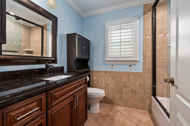 468 SW Prado Ave, Port Saint Lucie, FL 34983 - full bath featuring tile walls, vanity, ornamental molding, shower / bath combination with glass door, and tile patterned flooring