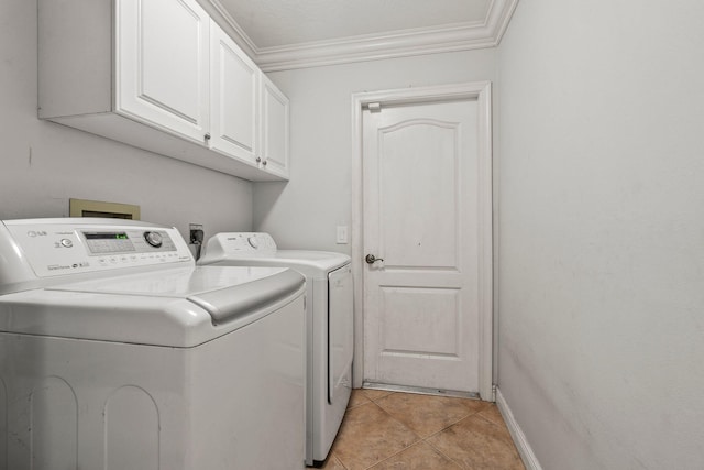468 SW Prado Ave, Port Saint Lucie, FL 34983 - laundry room with cabinet space, washer and dryer, crown molding, and light tile patterned flooring
