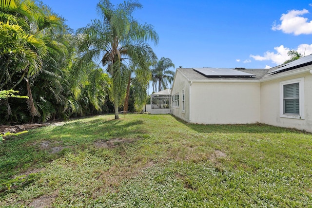 468 SW Prado Ave, Port Saint Lucie, FL 34983 - view of green lawn featuring a sunroom