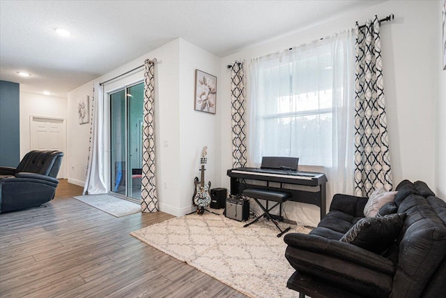 5371 NW Almond Ave, Port Saint Lucie, FL 34986 - living room with wood finished floors and recessed lighting