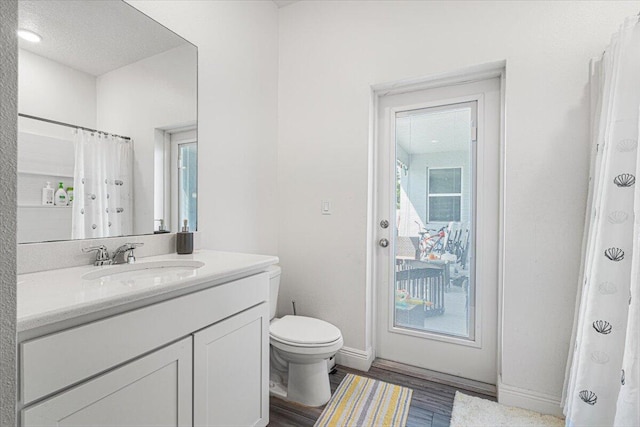 5371 NW Almond Ave, Port Saint Lucie, FL 34986 - bathroom featuring vanity and wood finished floors