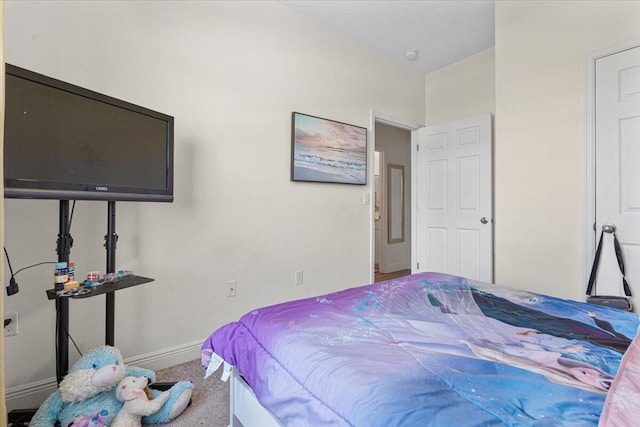5371 NW Almond Ave, Port Saint Lucie, FL 34986 - carpeted bedroom with baseboards