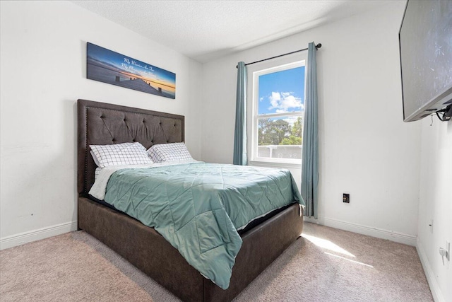 5371 NW Almond Ave, Port Saint Lucie, FL 34986 - carpeted bedroom featuring baseboards and a textured ceiling