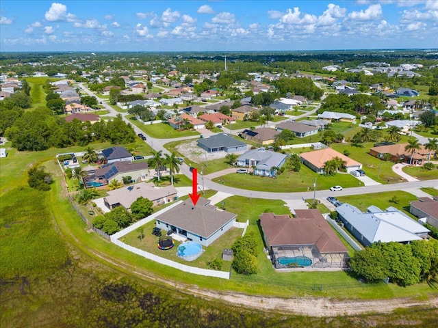 5371 NW Almond Ave, Port Saint Lucie, FL 34986 - aerial perspective of suburban area with a pool area